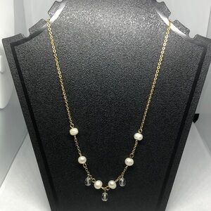 freshwater pearl and crystal necklace on a gold tone chin
